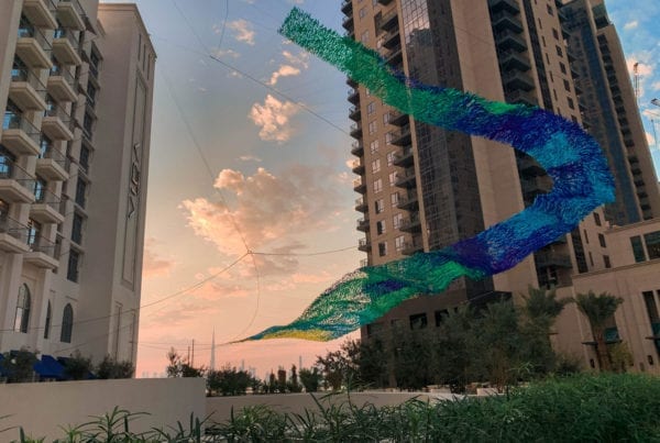 Poetic Kinetics' art piece Skyline Stream flying high over Dubai Creek Harbor